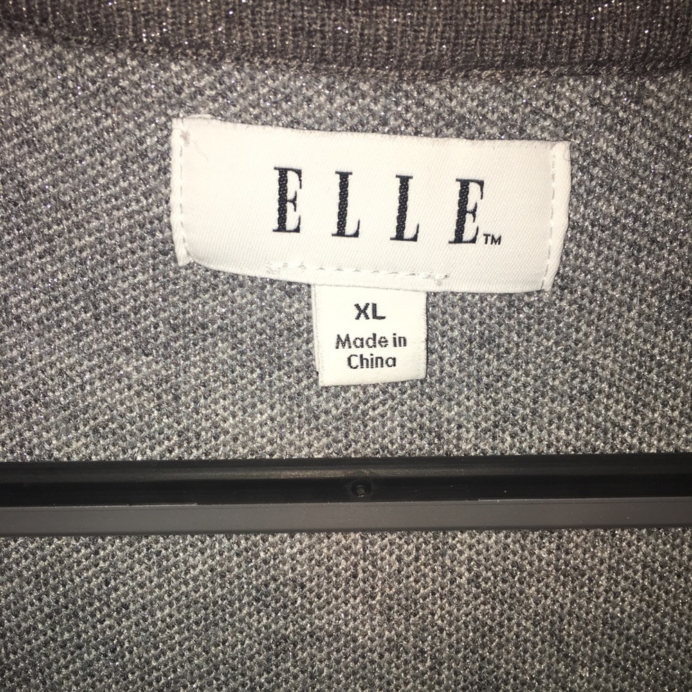 Long sweater/jacket. Never worn!